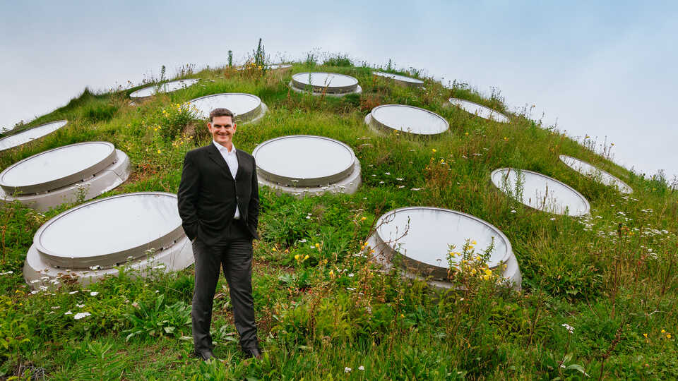 Cal Academy Executive Director Scott Sampson stands atop the Academy's green Living Roof