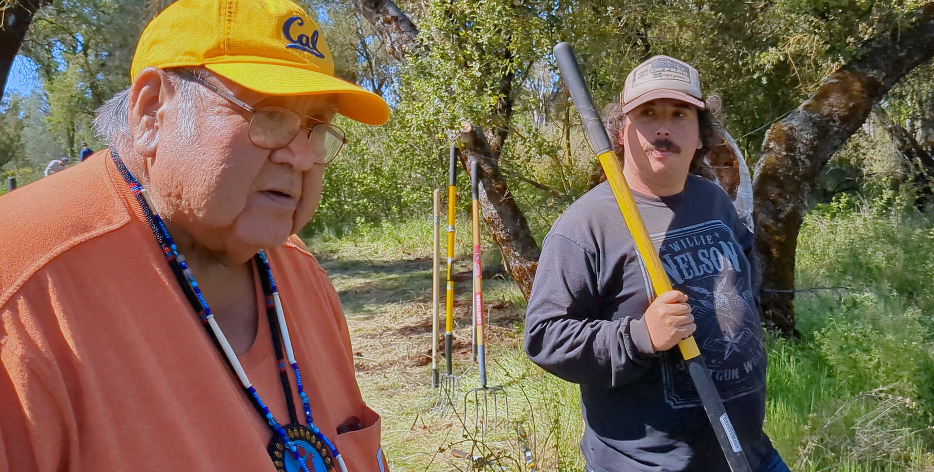 Ron Goode is pictured left with another cultural burn practitioner, discussing plans for the day.