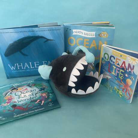 Storybooks with Anglerfish puppet in the middle